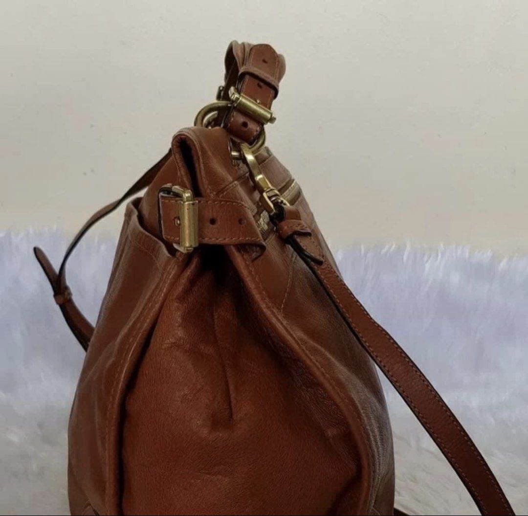 RUSH! Authentic Preloved Mulberry Satchel Bag (Category: Luxury Bags & Wallets) located in Baguio. Submitted by designerbin.ph (Listing ID 1451144705, Image 3). Description: Authentic Preloved Mulberry Satchel Bag Made in England Condition: Brown. Leather. Exterior back slip pocket with magnetic closure. Front Double zipper closure. Interior zipper pocket. Gold tone hardware. Removable strap. Gently used condition. Rank: 8/10. Some signs of norma