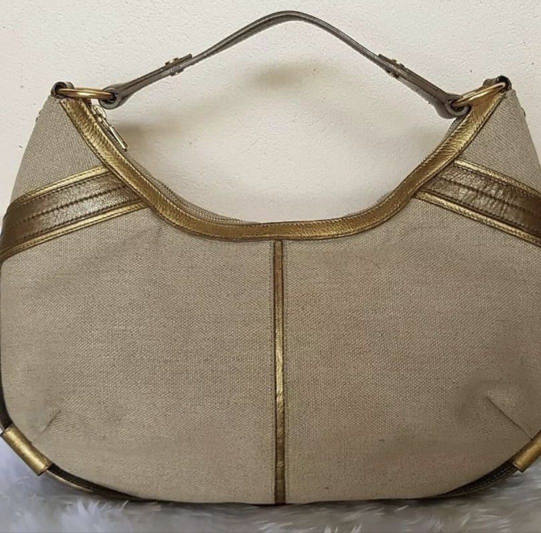 Last Day RUSH SALE Authentic Preloved YSL Yves Saint Laurent Shoulder Bag (Category: Luxury Bags & Wallets) located in Baguio. Submitted by designerbin.ph (Listing ID 1451224968, Image 2). Description: Authentic Preloved YSL Yves Saint Laurent Shoulder Bag Made in Italy Condition: Some signs of normal use. Small tear on interior tag please see photo but will not affect entire part of the bag. No flaw/damage or whatsoever. Measurement: H - 24 cm W