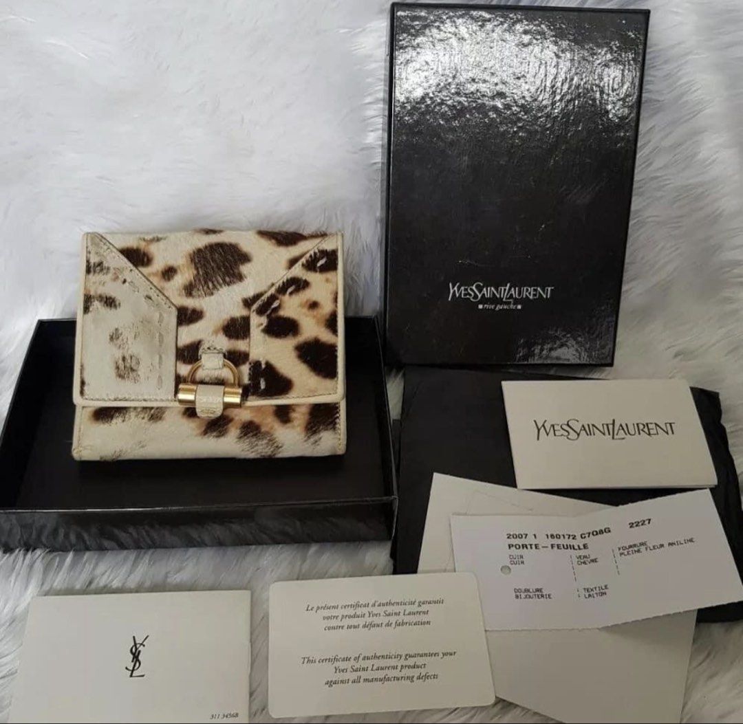 Authentic Preloved Yves Saint Laurent YSL Wallet (Category: Luxury Bags & Wallets) located in Baguio. Submitted by designerbin.ph (Listing ID 1451264106, Image 1). Description: Authentic Preloved Yves Saint Laurent YSL Wallet Made in Italy Condition: Signs of use Measurement: Credit Card Slots - 10 Bill Compartment - 2 Coin Pocket - 1 Slip Pocket - 2 ID Window - None H -11 cm W - 12 cm D - 2 cm Inclusion/s: Box, Care Card Authenticity: Money back