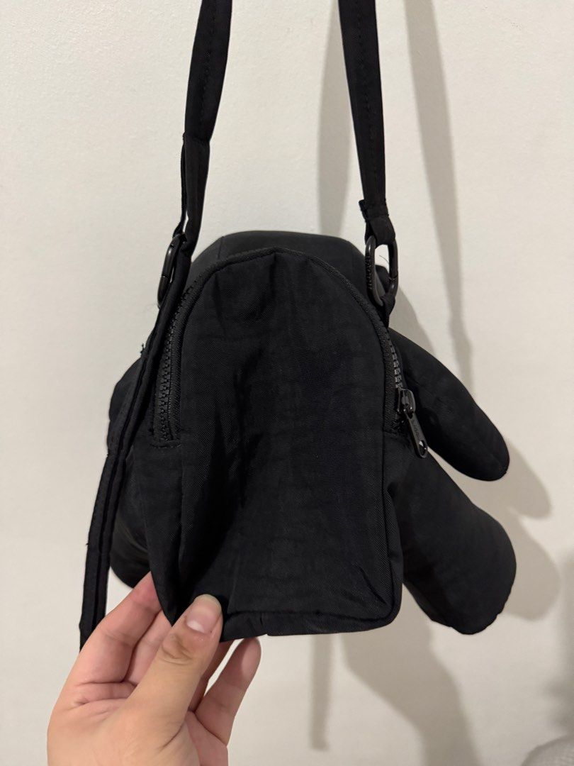 BAGGU Bear Bag - Black (Category: Cross-body Bags) located in Quezon City. Submitted by afpar (Listing ID 1451281165, Image 3). Description: - Adorable black teddy bear design by Baggu. - Secure zipper closure for the main compartment. - Adjustable strap for comfortable wear. - Ideal size for carrying your daily essentials. - Fun and quirky accessory with an embroidered Baggu logo on the paw..