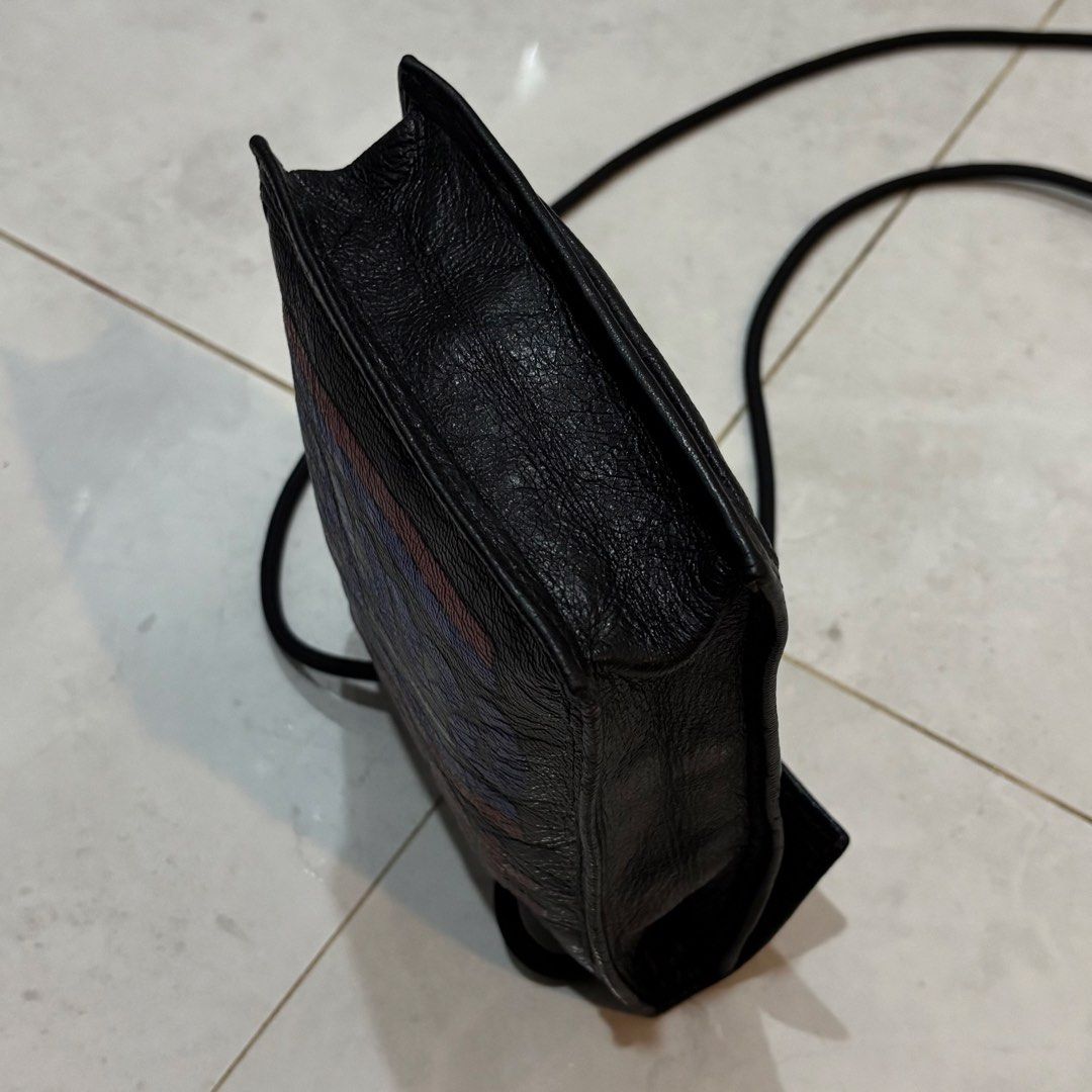 Balenciaga black leather graffiti explorer pouch (Category: Luxury Bags & Wallets) located in Cebu City. Submitted by florianmiral (Listing ID 1451263714, Image 3). Description: Balenciaga black leather graffiti explorer pouch Excellent condition .