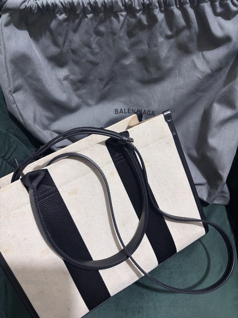 Balenciaga Canvas Tote (Category: Luxury Bags & Wallets) located in Quezon City. Submitted by jagab (Listing ID 1451258769, Image 3). Description: - AUTHENTIC Balenciaga tote bag - Material: Canvas and leather - Includes original dust bag - Needs cleaning - yellow Stains on both sides -still in very good condition!!.