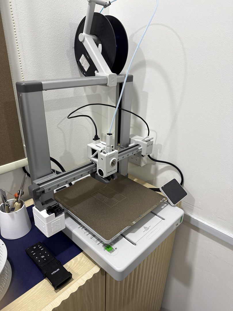 Bambu Lab A1 Printer (Category: Printers, Scanners & Copiers) located in Singapore. Submitted by thescribblistspace (Listing ID 1451322739, Image 1). Description: - include multi filament spool feeder - include many new filament (open and unopened) .