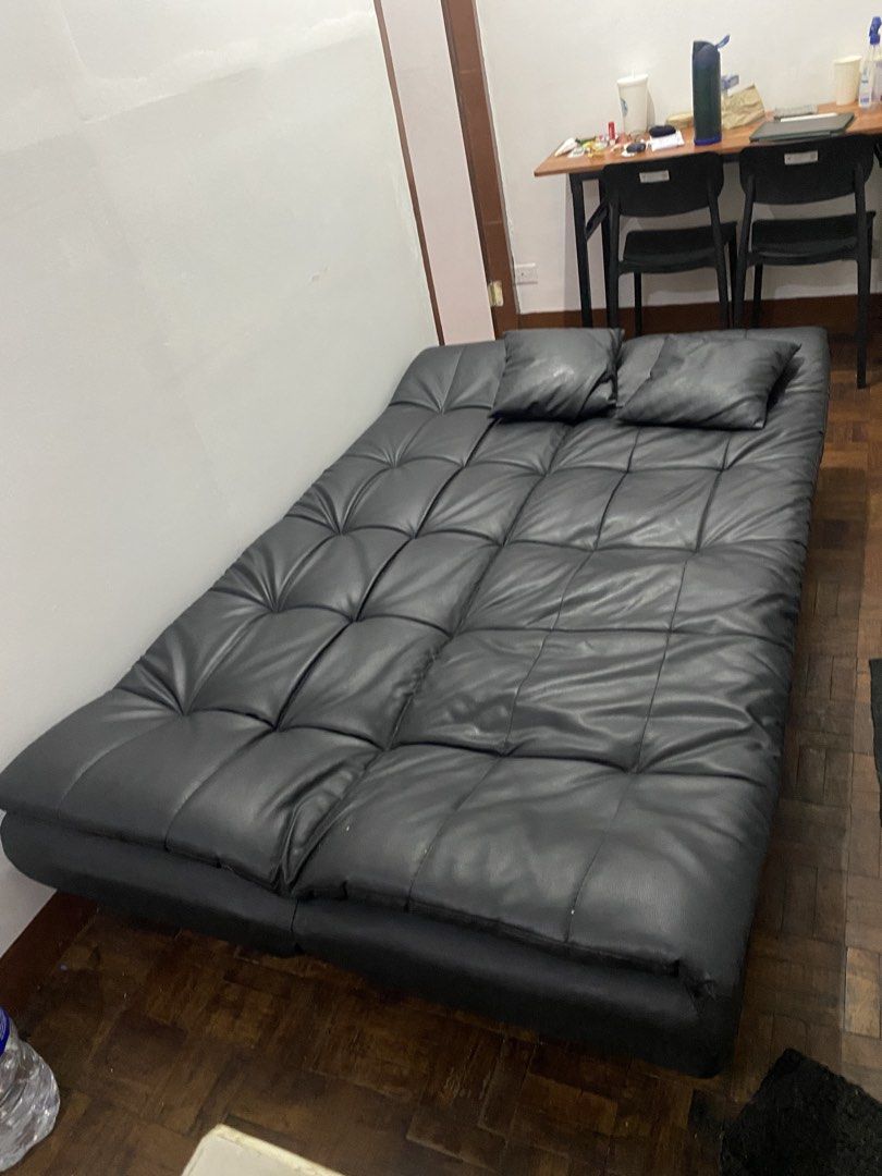 Black Faux Leather Tufted Sofa Bed with Pillows (Category: Sofas) located in Mandaluyong City. Submitted by tine_ipadair (Listing ID 1451308392, Image 2). Description: Leather sofa-bed Price negotiable folded 85cm width 82cm height 180cm length bed 110cm width 42cm height 180cm length Shaw Boulevard, Mandaluyong City. Pull out August 8.