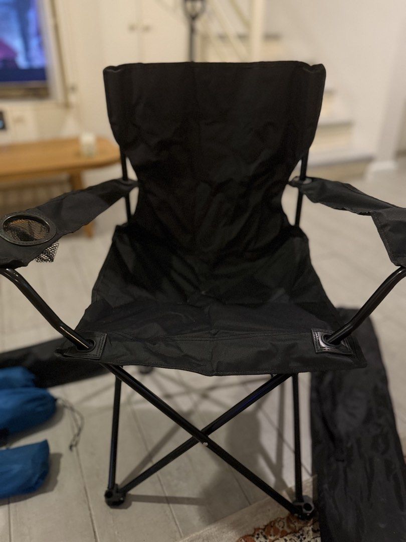Black Folding Camping Chair with Cup Holder (Category: Chairs) located in Pasig City. Submitted by atticstreet (Listing ID 1451170793, Image 3). Description: * Portable folding chair * Black fabric seat and back * Built-in cup holder on armrest * Folds compactly for easy storage and transport * Comes with a black carrying bag * Ideal for camping, picnics, and backyard use.