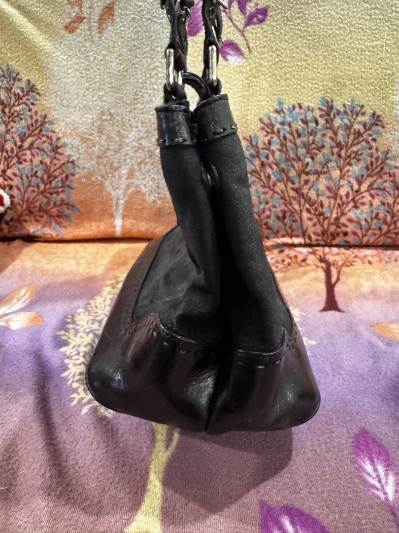 Coach Black Leather and Suede Shoulder Bag (Category: Luxury Bags & Wallets) located in Muntinlupa City. Submitted by prelovedbrandedgoodies (Listing ID 1451152839, Image 3). Description: - Classic black shoulder bag - Mix of smooth leather and soft suede - Secure buckle closure on front flap - Convenient zippered pocket on the back - Comfortable shoulder straps - Ideal for everyday use - repainted -hard suede na kase repainted.