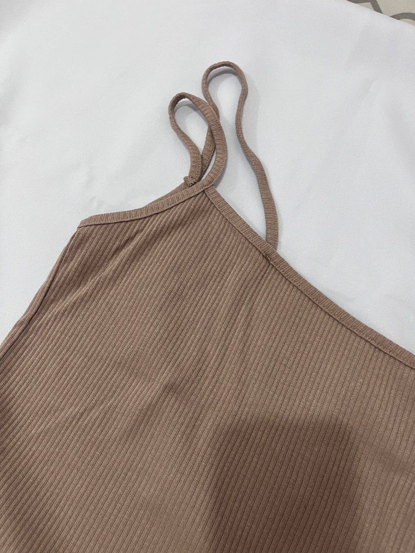 Brown Ribbed One Shoulder Tank Top (Category: Sleeveless) located in Las Pinas. Submitted by _potatoee (Listing ID 1451282528, Image 2). Description: Brown ribbed one-shoulder tank top. Stretchy fabric. Lettuce hem. Fits S-M. Layering piece..