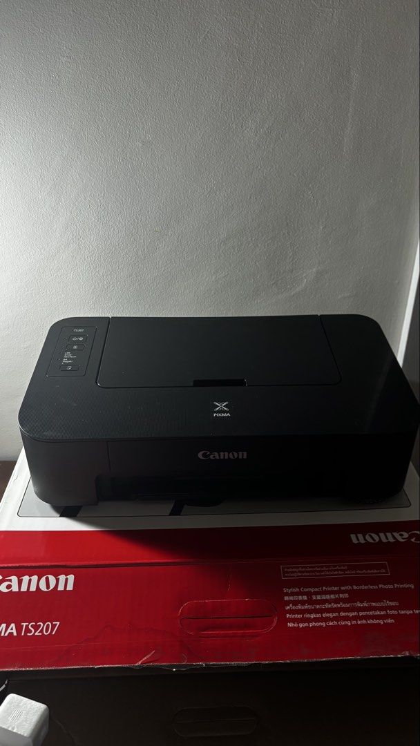 CANON PIXMA TS207 (Category: Printers, Scanners & Copiers) located in Cavite. Submitted by prelovedbyreluv (Listing ID 1451247201, Image 1). Description: After maubos yung 1 cartridge hindi na nag refill and hindi na nagamit. Nakastock nalang. Complete w/ box, papers, and cd .