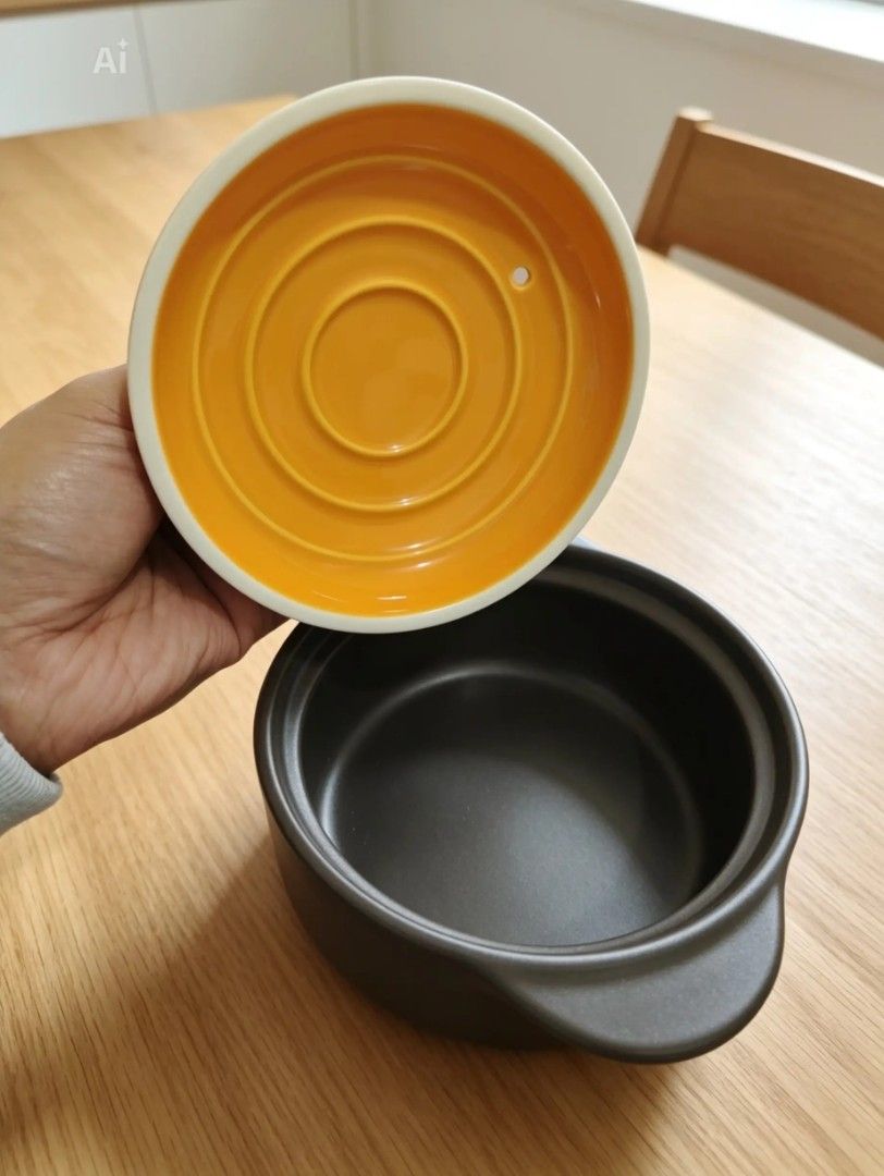 Ceramic pot Neoflam Korea Stovetop and baking pit (Category: Cookware & Accessories) located in Baguio. Submitted by noona_faith (Listing ID 1451241562, Image 2). Description: Genuine Neoflam cookware from Korea, complete with original box. Details: - Brand: Neoflam ("Bringing Kitchens to Life") - Collection: Line Ceramic Pot, Small size - 5inches width by 2inches height - Material: Ceramic non-stick coating, made from natural materials - Stoveto