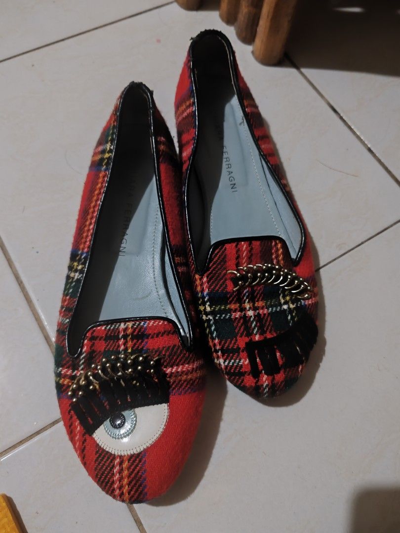 Chiara Ferragni Red Plaid Eye Flats (Category: Flats & Sandals) located in Pasig City. Submitted by geraldnee28280 (Listing ID 1451295247, Image 3). Description: - Upgraded Soles with High Quality Toppy Brand Rubber - No Box / in very good condition - Eye-catching red plaid flats - Iconic Chiara Ferragni eye design - Comfortable slip-on flat sole - Bold and personality-filled tartan pattern - Features Chiara Ferragni logo on the interior.