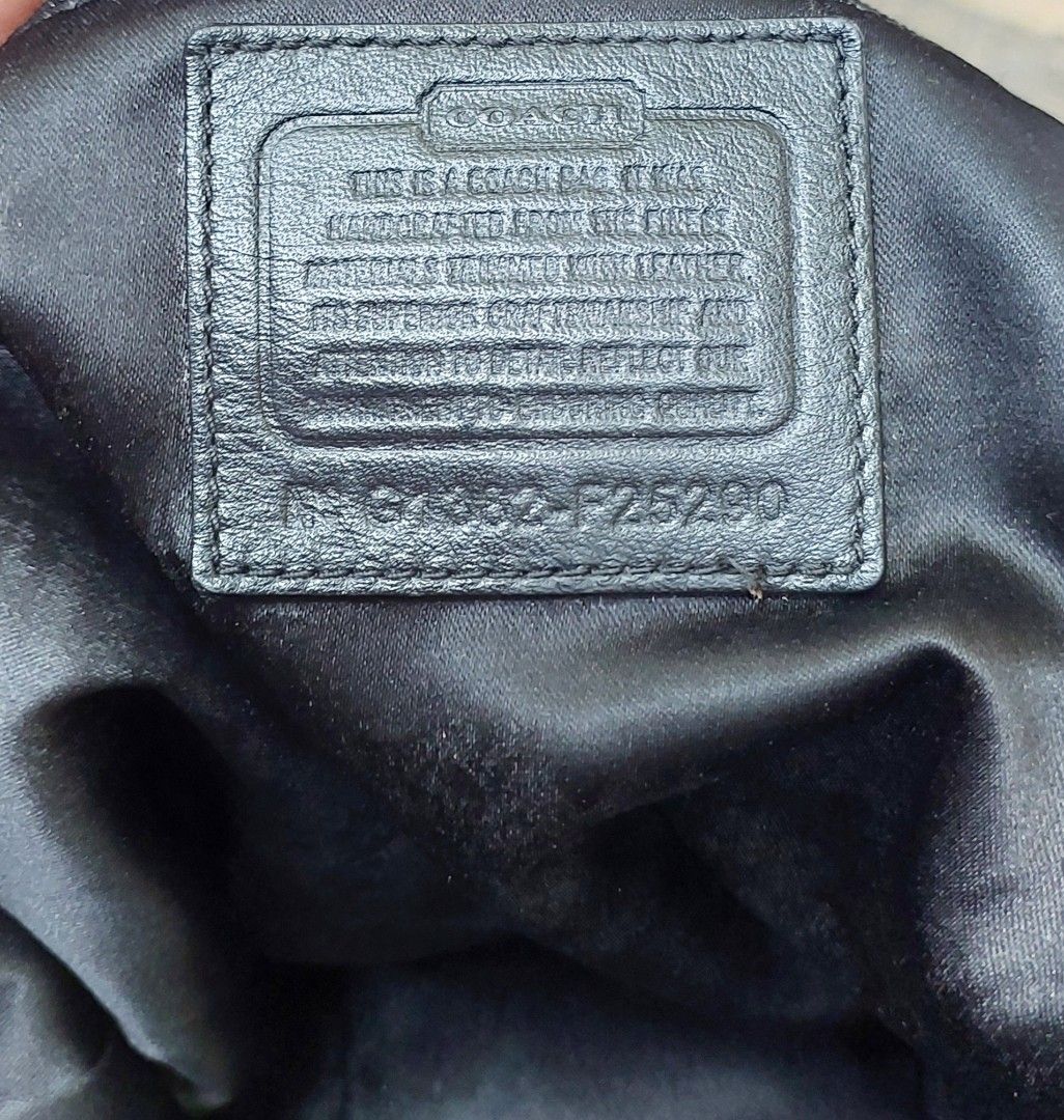 Coach Signature Monogram Tote Bag (Category: Luxury Bags & Wallets) located in Quezon City. Submitted by ruthie3 (Listing ID 1451179424, Image 3). Description: -issue no sling Classic Coach tote bag - Signature dark brown monogram pattern - Black leather trim and handles - Front flap pocket with buckle closure - Zippered main compartment - Interior leather creed patch with serial number - Perfect everyday bag.
