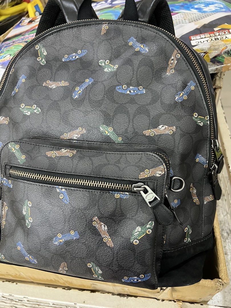 Coach West Backpack (Category: Luxury Bags & Wallets) located in Bacolod City. Submitted by novymae23 (Listing ID 1451155377, Image 2). Description: Coach West Backpack sigcolorful vintage car print Size Large Excellent Condition.