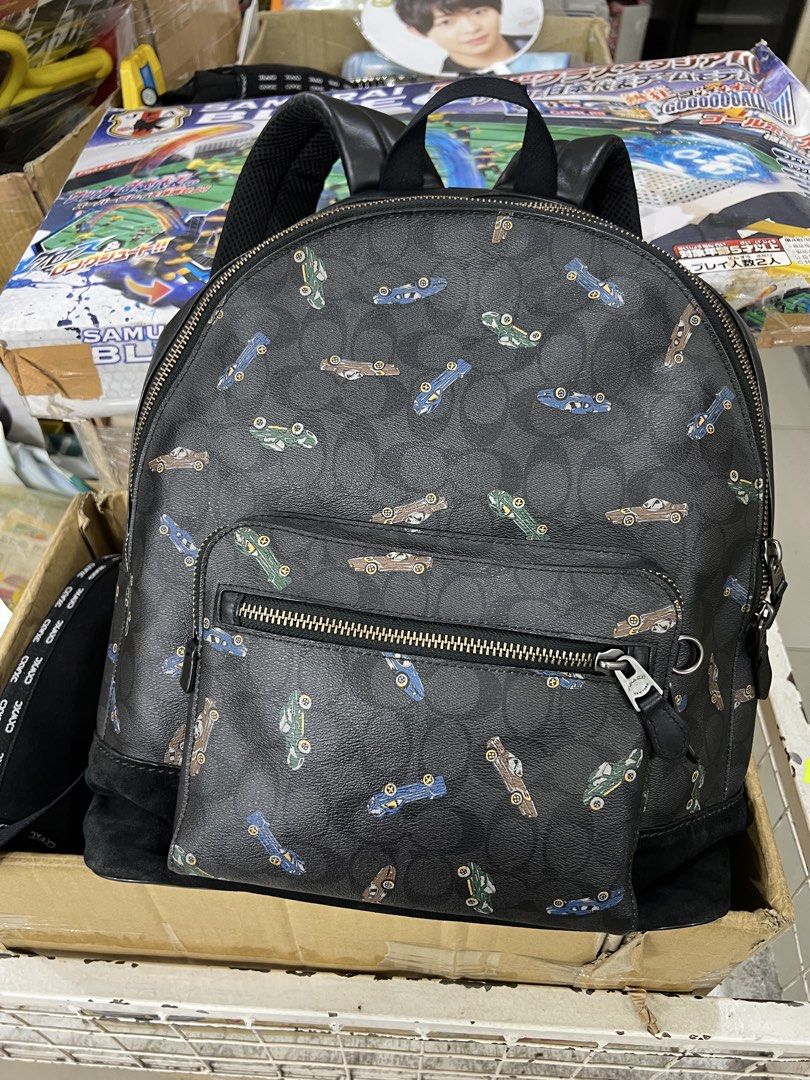 Coach West Backpack (Category: Luxury Bags & Wallets) located in Bacolod City. Submitted by novymae23 (Listing ID 1451155377, Image 1). Description: Coach West Backpack sigcolorful vintage car print Size Large Excellent Condition.