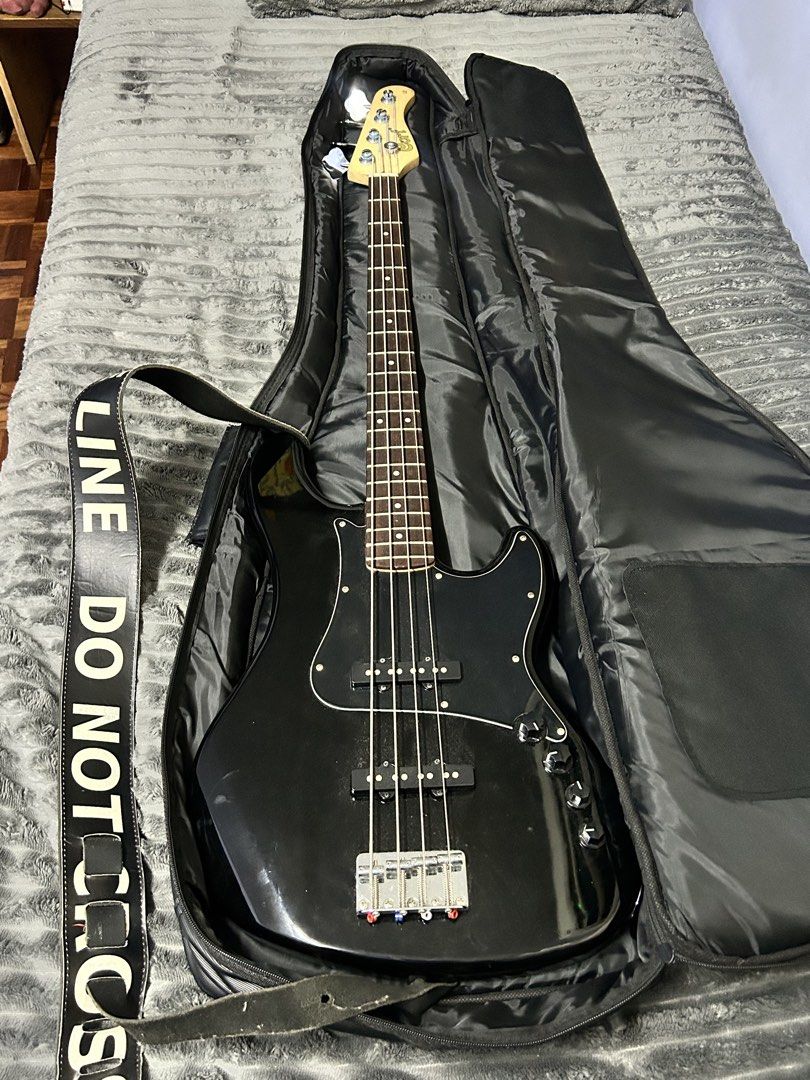Cort GB34JJ Active 4 String Jazz Bass Guitar (Category: Musical Instruments) located in Manila. Submitted by jdelizo (Listing ID 1451314756, Image 2). Description: Hey! Selling this bass❗️ Condition is really good, no issues at all, reason for selling is need funds. No mods done to it either. Additional freebies: - Comes with free bag from Lazer - Black Police Guitar Strap as seen in photo above.
