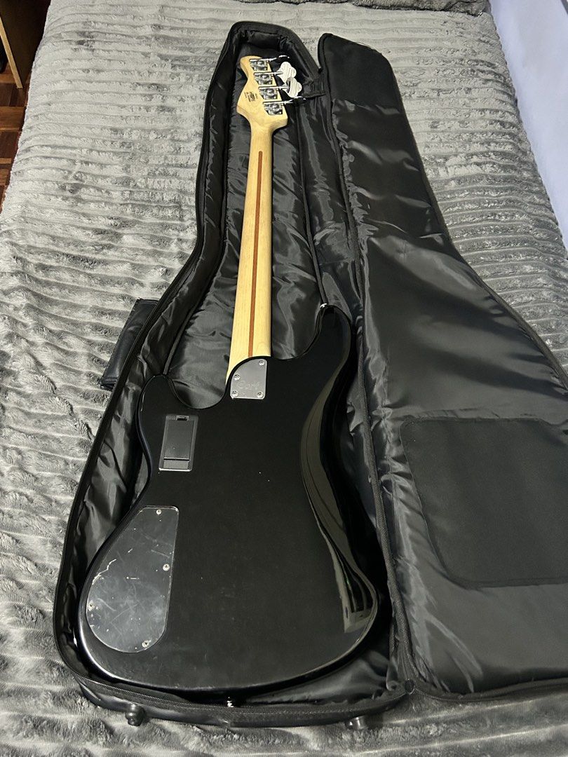 Cort GB34JJ Active 4 String Jazz Bass Guitar (Category: Musical Instruments) located in Manila. Submitted by jdelizo (Listing ID 1451314756, Image 3). Description: Hey! Selling this bass❗️ Condition is really good, no issues at all, reason for selling is need funds. No mods done to it either. Additional freebies: - Comes with free bag from Lazer - Black Police Guitar Strap as seen in photo above.