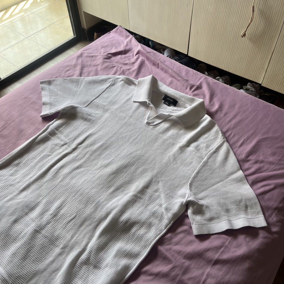 Cotton On Knit Polo Shirt (Category: Tshirts & Polo Shirts ) located in Paranaque City. Submitted by ryanbyt (Listing ID 1451144725, Image 2). Description: Cotton On White Knitted Textured Polo Shirt - 10/10 excellent condition - Personal item, bought from Cotton On store (not thrifted) Size M Width 20” Length 28” Message for inquiries .