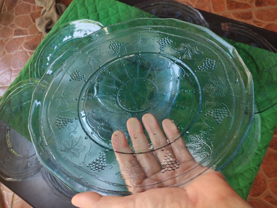 Crystal plates/bowls (Category: Dinnerware & Cutlery) located in Manila. Submitted by margeventa (Listing ID 1451162492, Image 2). Description: blue crystal plates grape design 10.5" 150 each(10pcs) thick crytal bowl with blue hues 150 each frosted set bowls take all 600 * buyer shoulders sf Location:CAINTA.