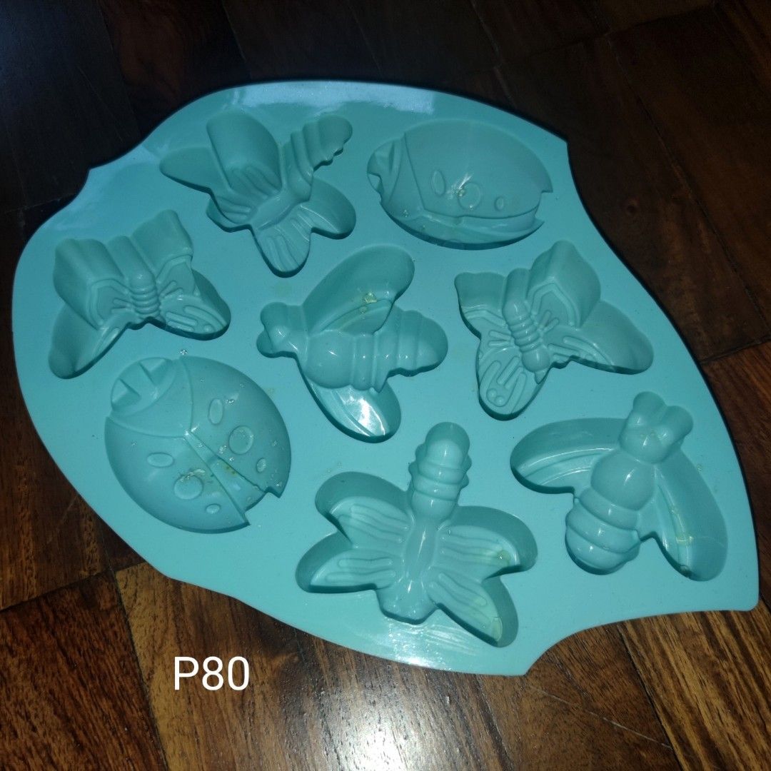 Cute Insect Silicone Mold for Baking or Crafts (Category: Bakeware) located in Muntinlupa City. Submitted by angeline_cga (Listing ID 1451151841, Image 1). Description: - silicone mold - Features various insect shapes: butterflies, bees, ladybugs - Ideal for baking cookies, chocolates, and candies - Also great for DIY crafts like soap and candle making - Flexible and easy to clean - Fun for kids' parties and themed events.