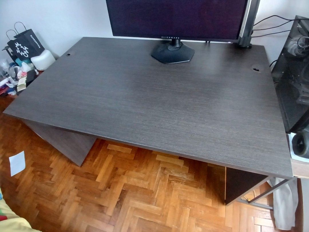 Study Table / Computer Desk (Category: Tables & Sets) located in Singapore. Submitted by johnnyleegs (Listing ID 1451230312, Image 1). Description: Sturdy computer desk/study tavle Solid wood table in good condition Tabletop is sturdy with no warping or bending Comes with 2 cable grommets (one on each side) for neat cable management Dimensions: Height: 74 cm Length: 120 cm Depth: 75 cm.