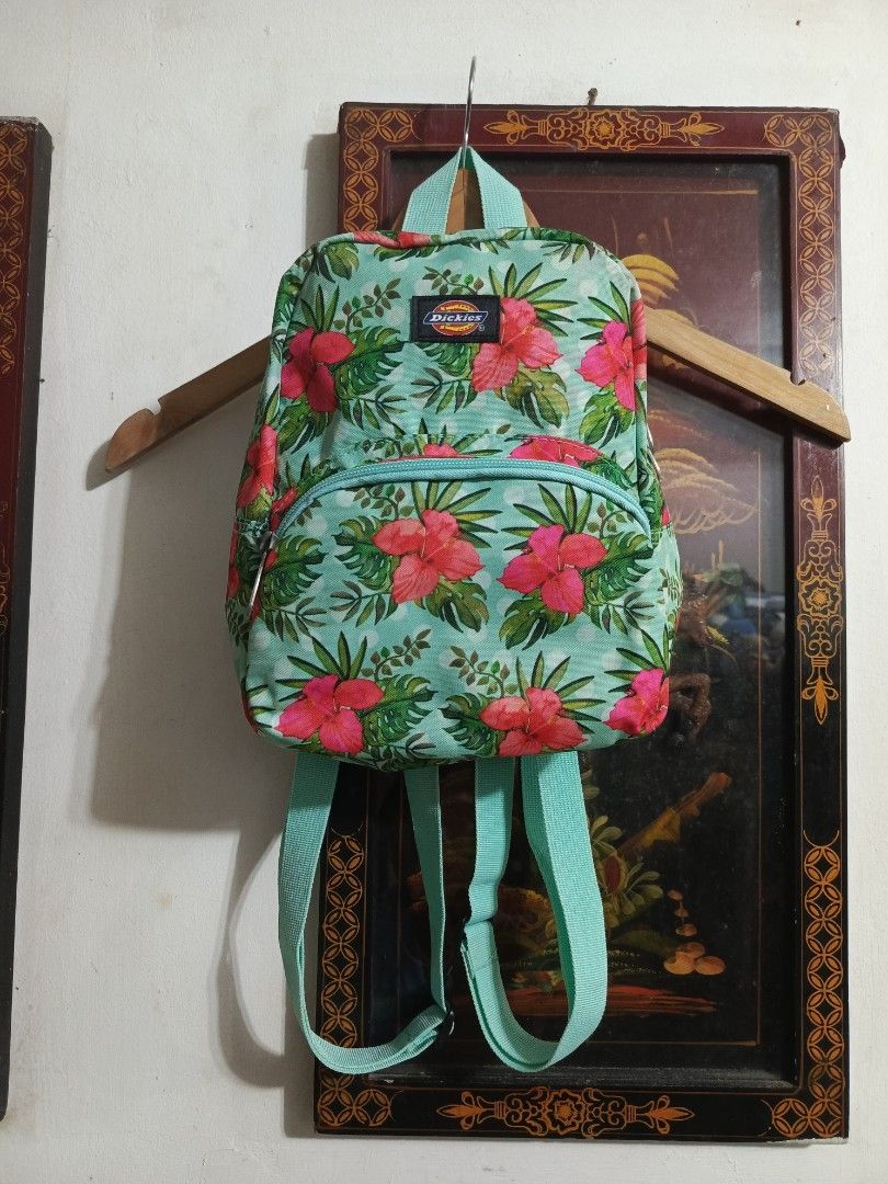 Dickies Tropical Floral Backpack (Category: Backpacks) located in Manila. Submitted by fiercehorse-60ca (Listing ID 1451306645, Image 1). Description: - Cute Dickies backpack - Tropical floral print (light blue with pink flowers & green leaves) - Main compartment - Front zip pocket - Adjustable straps - Ideal for everyday use or travel.
