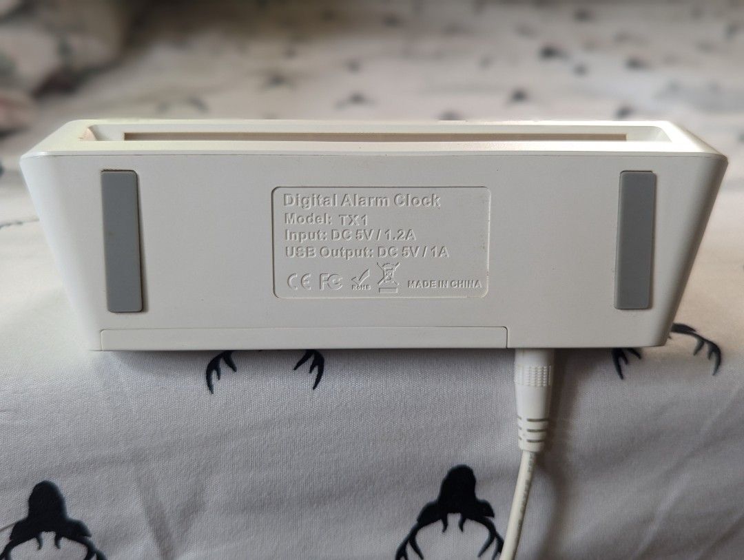 Digital Alarm Clock with RGB Lighting (Category: Clocks) located in Mandaluyong City. Submitted by sevenoctobers (Listing ID 1451155090, Image 3). Description: Digital alarm clock with vibrant RGB display and night light. Used but in good condition. Large, easy-to-read colorful time display. Adjustable snooze time (5-15 minutes). Adjustable volume and light dimmer. Seven lighting color preferences and multicolor display choices. Comes with origin