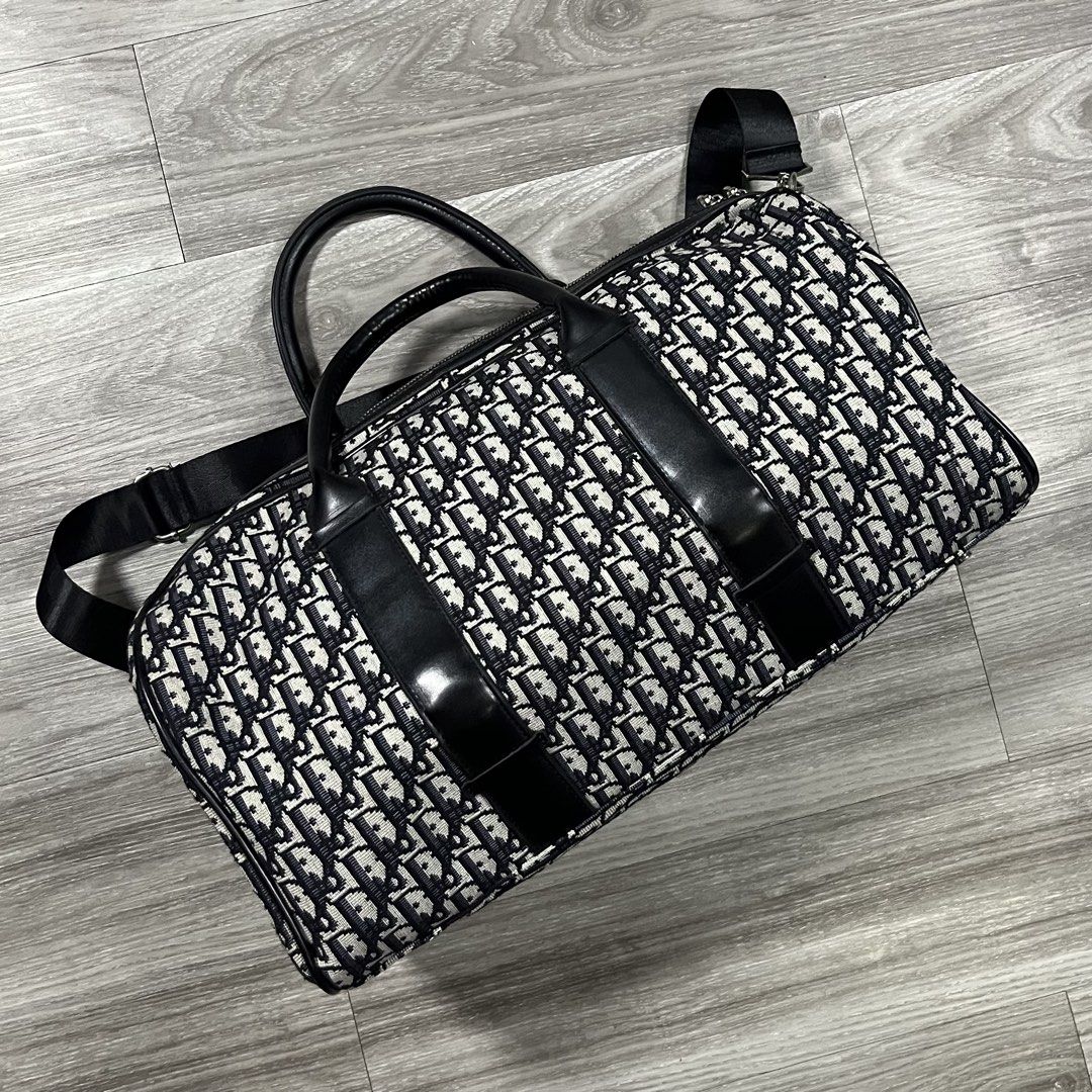Dior Oblique Monogram Travel Bag (Category: Luxury Bags & Wallets) located in Cebu City. Submitted by specializedgoodsitem_ (Listing ID 1451227003, Image 3). Description: good as new no flaws details posted color may vary due to light 18.5’ width 9.5’ length .