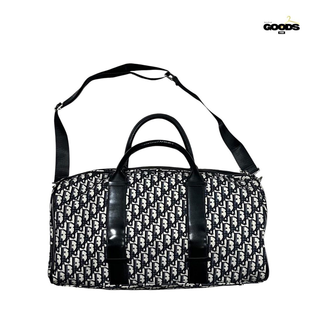 Dior Oblique Monogram Travel Bag (Category: Luxury Bags & Wallets) located in Cebu City. Submitted by specializedgoodsitem_ (Listing ID 1451227003, Image 1). Description: good as new no flaws details posted color may vary due to light 18.5’ width 9.5’ length .