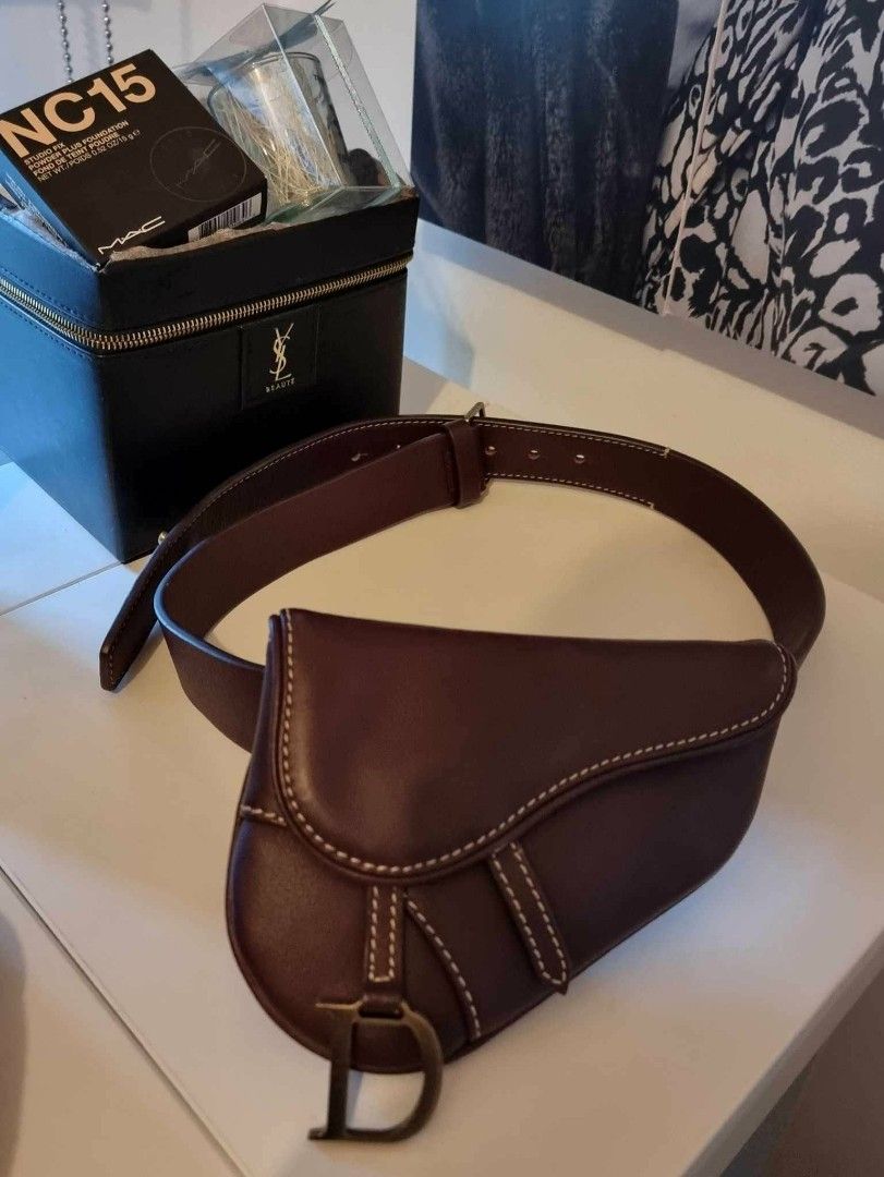 Dior Saddle Bag Belt Bag Brown Leather (Category: Luxury Bags & Wallets) located in Quezon City. Submitted by sakura333_888 (Listing ID 1451218193, Image 1). Description: - Authentic brown leather Dior saddle bag - Iconic 'D' charm - Detailed stitching throughout - Versatile: can be worn as a belt bag - Ideal for carrying your daily essentials.