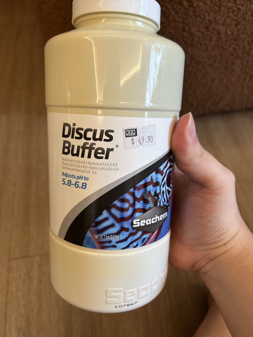 Discus buffer (Category: Homes & Other Pet Accessories) located in Singapore. Submitted by youngforest.16a6b8 (Listing ID 1451182303, Image 1). Description: Half bottle left. Throw in used anti chorline and Prada gold, less than half bottle left .