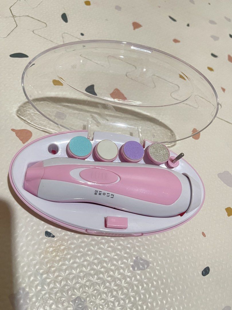 Electric Baby Nail Trimmer (Category: Baby Toiletries & Grooming) located in Quezon City. Submitted by monicagelz2164 (Listing ID 1451256223, Image 1). Description: Kulang lang po ng isang pang trim. See photo. Pero yung mga natira all good pa po. Please see my other posts. Baka may magustuhan po kayo for your baby. Thank you :).