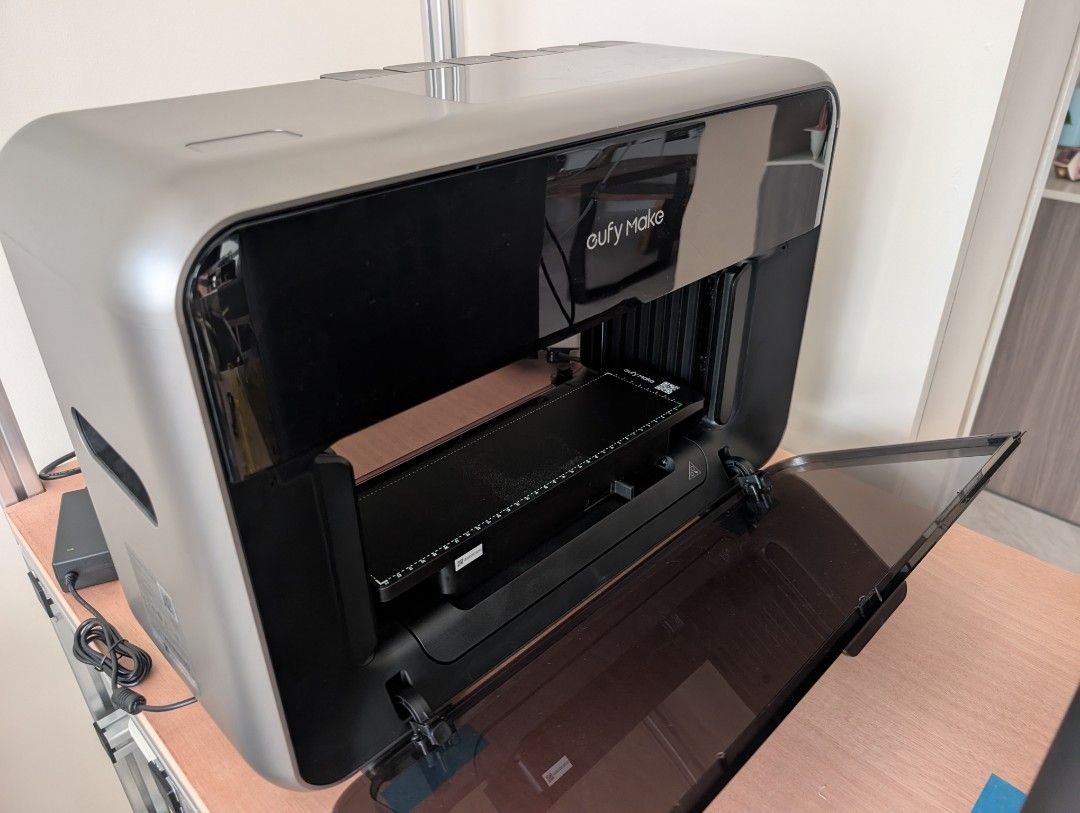 eufymake E1 (Category: Printers, Scanners & Copiers) located in Singapore. Submitted by mingxd94 (Listing ID 1451139005, Image 2). Description: Items included: - eufyMake E1 + DTF laminater - Includes 1 sealed pack of 25 Standard UV DTF A Film, mini build plate, standard build plate (extra standard build sheet) - Machine is clean and well-maintained - ink used about 5-10% UV printer E1 - current price $3500 DTF Laminator - current price $599.