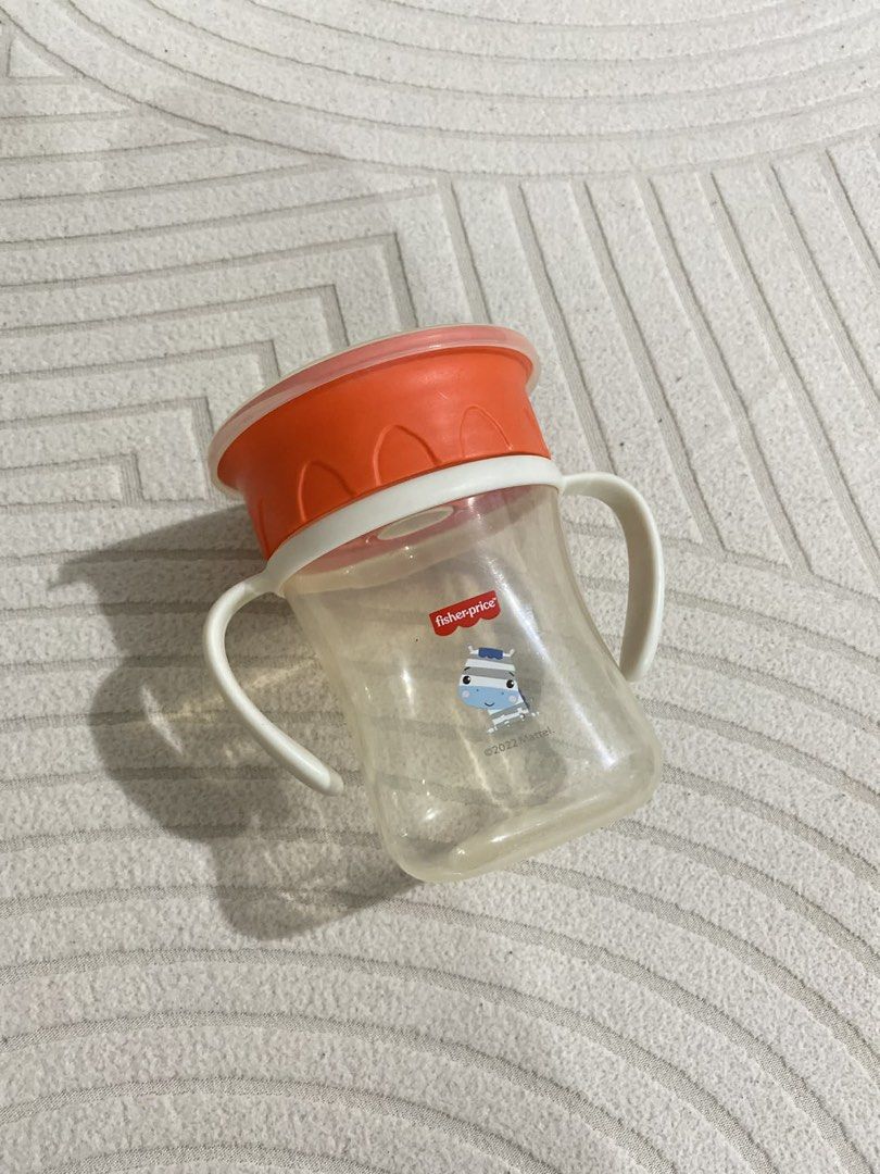 Fisher Price Training Cup 2 Handle All Round Sippy Cup (Category: Weaning & Toddler Feeding) located in Batangas. Submitted by lifewithxhan.ph (Listing ID 1451232658, Image 1). Description: Fisher Price Training Cup 2 Handle All Round Sippy Cup w/ FREE Pigeon Bottle - Used once, my toddler doesn't like it. .