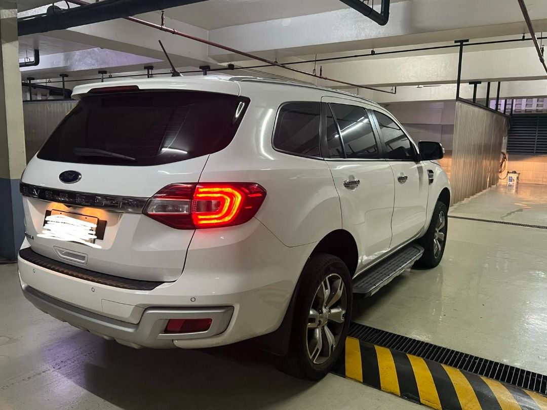 Ford Everest (Category: Used Cars) located in Manila. Submitted by kaymarievp (Listing ID 1451206149, Image 3). Description: FOR SALE: 2018 Ford Everest Titanium 2.2L AT Diesel Price: 800,000 (Negotiable) First owner, well-maintained, and low mileage (49,725 km). White, Automatic, Diesel, 7-seater SUV. Complete OR/CR and 2 original smart keys. Features: Leather seats, push start/smart key, touchscreen infotainment, reverse camera, front & rear pa