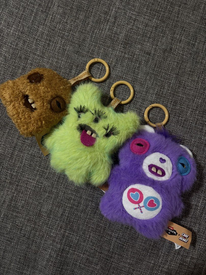 Fuggler keychains (Category: Plushies & Soft Toys) located in Singapore. Submitted by by.nvrulpreloved (Listing ID 1451264937, Image 1). Description: - nugget fuggler ( $8 ) - green fuggler baddie ( $12 ) - purple care bear fuggler ❌ mailing : +$1.50.