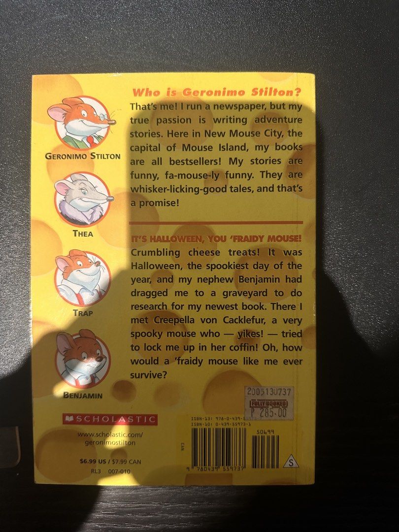 Geronimo Stilton: It's Halloween, You 'Fraidy Mouse! (Category: Children's Books) located in Quezon City. Submitted by kl.secondhand (Listing ID 1451312185, Image 3). Description: - Geronimo Stilton: 'It's Halloween, You 'Fraidy Mouse!' book - Features Geronimo and his nephew Benjamin on a Halloween adventure - Includes 30 pages of Halloween games and costume ideas - Ideal for young readers who enjoy spooky stories - Published by Scholastic.