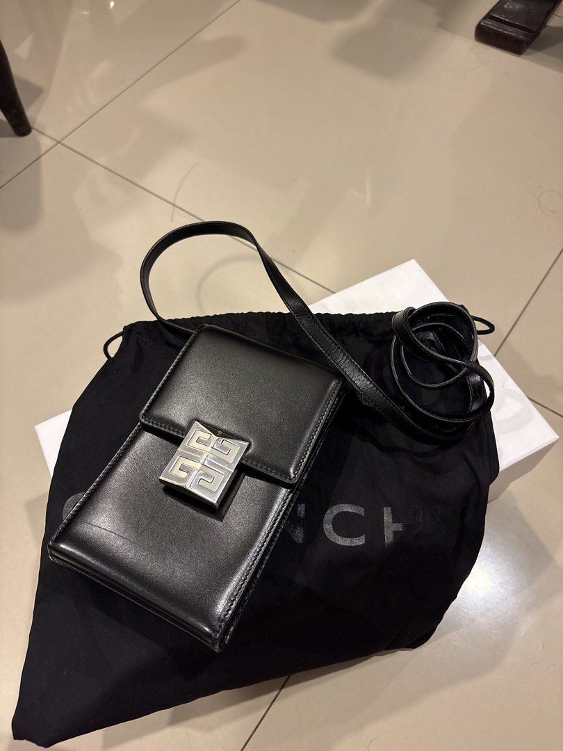 Givenchy 4G Mini Vertical Crossbody Bag Black Leather (Category: Luxury Bags & Wallets) located in Manila. Submitted by paulineeguzman2 (Listing ID 1451258982, Image 2). Description: - Authentic Givenchy 4G Mini Vertical Crossbody bag - Color: Black leather - Hardware: Silver - Includes: Dust bag - Features: Adjustable strap - Ideal for: Carrying essentials.