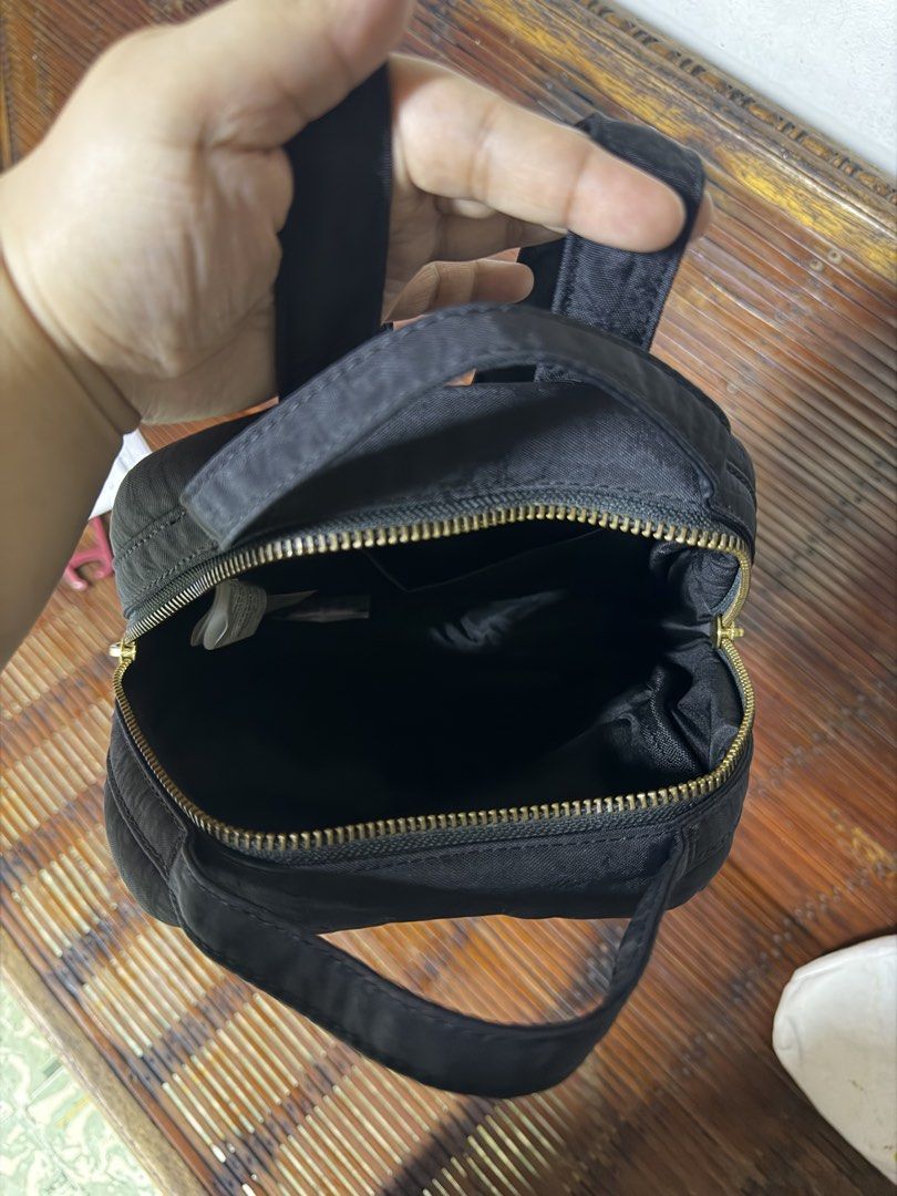 Herschel Mini Orion Backpack (Category: Backpacks) located in Manila. Submitted by tonrgsp_ (Listing ID 1451168401, Image 3). Description: - Black Herschel mini backpack - Size: 9.25" (H) x 8" (W) x 3.75" (D) - Can fit long wallet - Adjustable shoulder straps - Top handle for easy carrying - Compact and ideal for everyday use or travel - Used 5x, good as new.