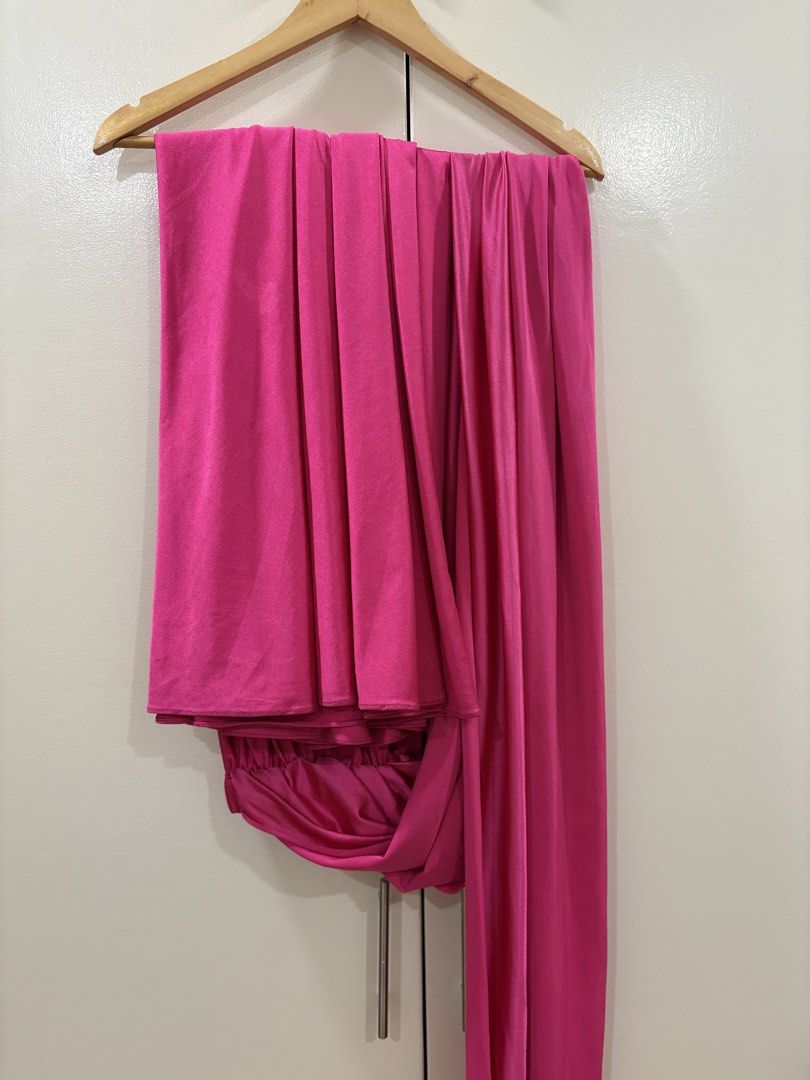 Hot Pink Infinity Dress Gown (Category: Dresses) located in Paranaque City. Submitted by macabelli (Listing ID 1451245360, Image 2). Description: - Vibrant hot pink infinity dress / gown - Can be styled many ways - Ideal for events, weddings, debut, and parties - One size fits most due to adjustable wrap style - Selling as it's no longer needed.