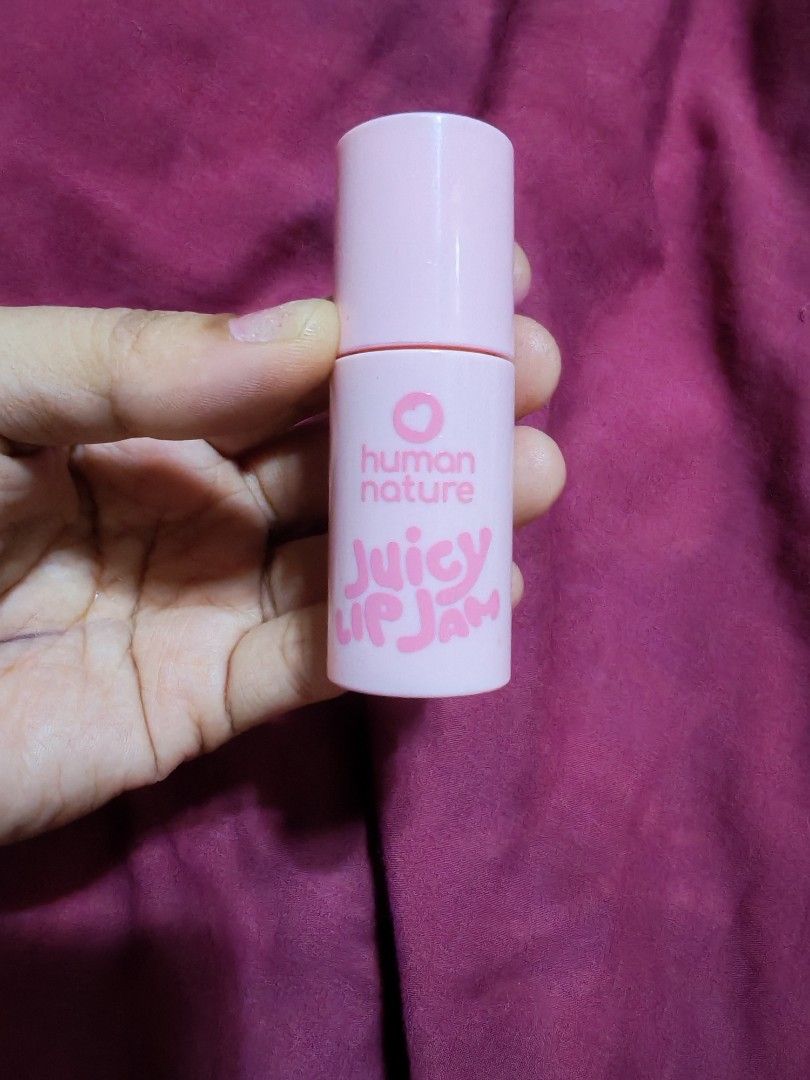 Human Nature Juicy Lip Jam - Pink Lychee (Category: Makeup) located in Quezon City. Submitted by dolcegioia (Listing ID 1451223336, Image 1). Description: - Human Nature Juicy Lip Jam in Pink Lychee - Provides a nice tint and moisture for your lips - Easy to apply - Expiry Date: April 2027 - Reason for selling: Too many lip products.