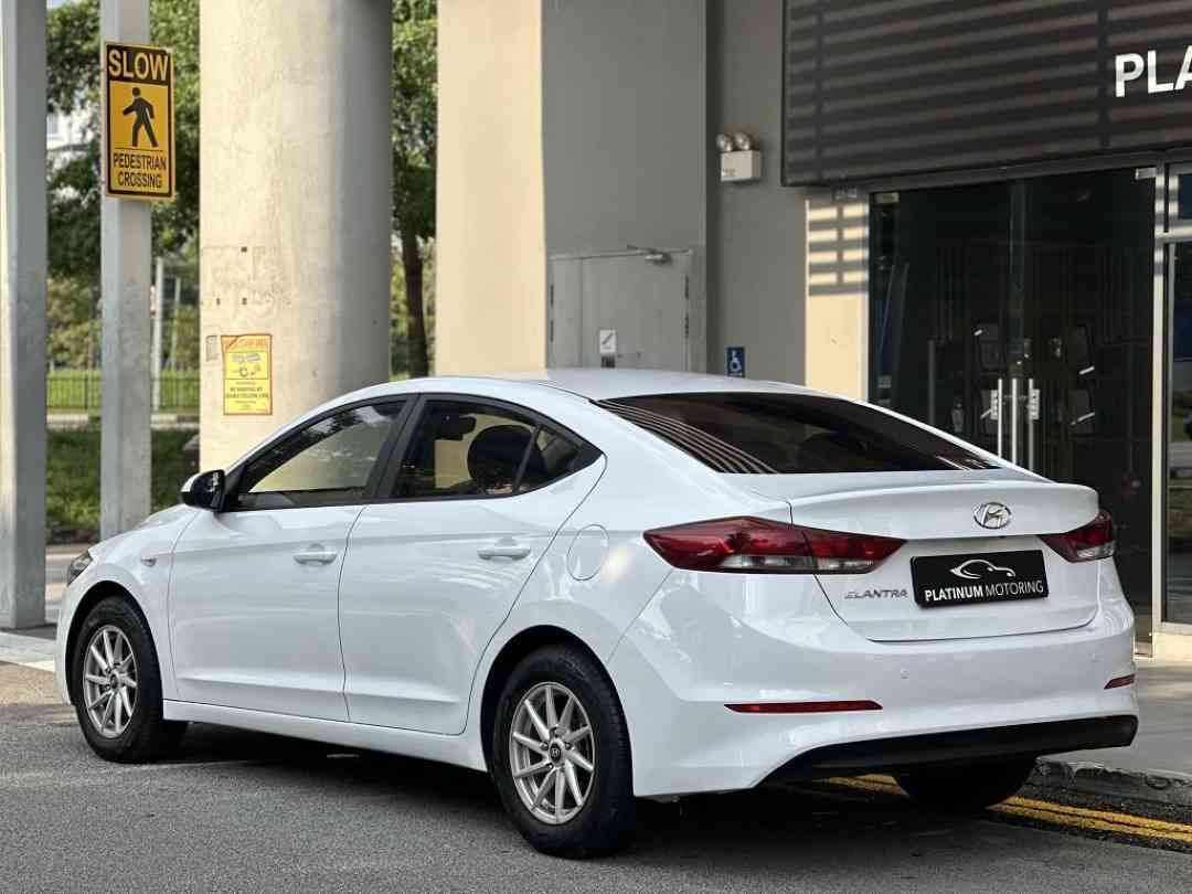 Hyundai Elantra 1.6 GLS (A) (Category: Used Cars) located in Singapore. Submitted by platinummotoringsg (Listing ID 1451153158, Image 3). Description: Interest rates from as low as 1.28%! Full loan available. Choose from bank or in-house financing! Proudly awarded Sgcarmart Premium Dealer for 3 consecutive years since 2023!Singapore's largest pre-owned dealership with 500+ listings, we offer higher trade-in value, better approval rates, and some 