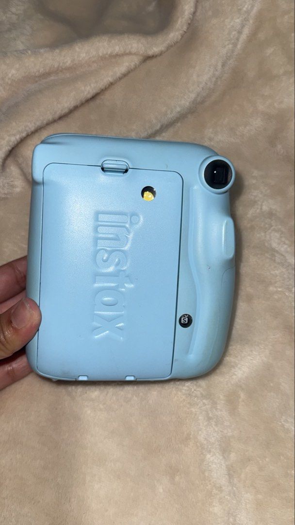Instax mini 11 (Category: Cameras) located in Baguio. Submitted by linebylienne (Listing ID 1451201294, Image 2). Description: Working Minor yellowish stains Rfs: i need fund to ug Loaded with alkaline battery Price still negotiable Will try to find pa the orig box and strap.