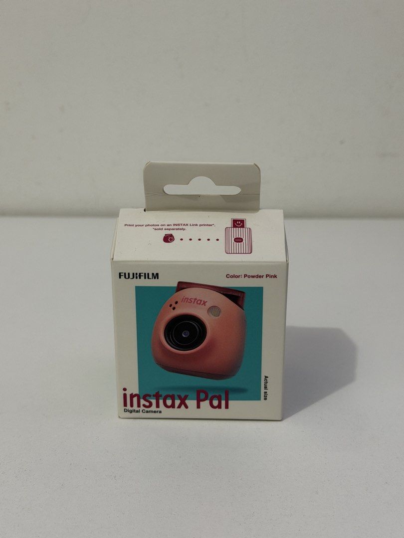 Instax Pal Powder Pink Digital Camera (Category: Cameras) located in Quezon City. Submitted by thriftbanditttt_ (Listing ID 1451278745, Image 2). Description: Instax Pal Camera BRAND NEW NEVER USED. RFS: decluttering 📍 Ever Commonwealth QC.