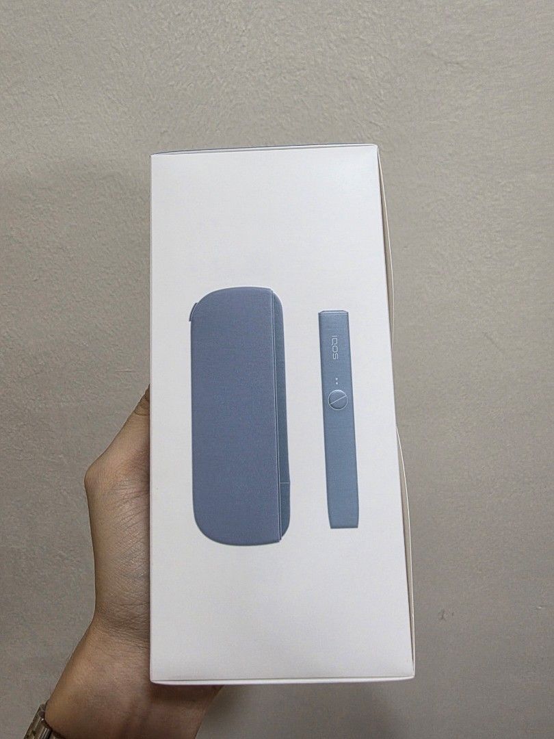 IQOS ILUMA Smartcore Induction System (Category: Other Gadgets) located in Johor Bahru. Submitted by dongliang_00 (Listing ID 1451160855, Image 2). Description: - Brand New & Sealed IQOS ILUMA - Sleek Blue Device - Smartcore Induction System - Clean White & Blue Box Packaging - Ideal alternative for smokers.