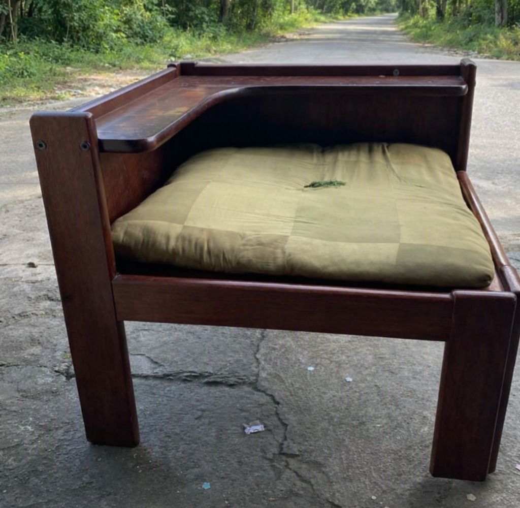 Karimaku-style corner bench (Category: Chairs) located in Caloocan City. Submitted by maisonmem (Listing ID 1451255643, Image 2). Description: - Unique dark wood corner chair - Sturdy construction for durability - Vintage accent piece - Ready to find its new home.