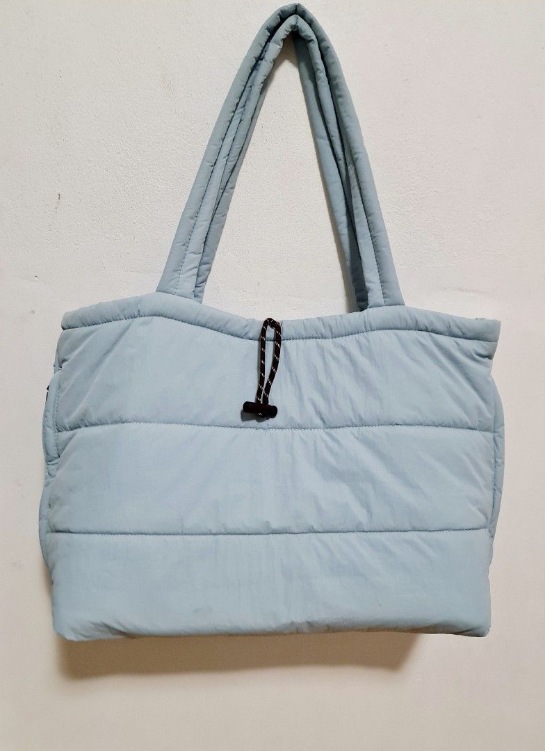 Large Light Blue Puffer Tote Bag (Category: Women's Bags & Wallets) located in Sydney. Submitted by desirably (Listing ID 1451253799, Image 2). Description: Large light blue puffer tote bag for $25. Used lightly&in excellent condition. Chic, functional and super handy - perfect for gym, travel, work, school... Approx. 45cm*35cm*22cm Pick up from Marrickville. Pls feel free to check out my other listings..