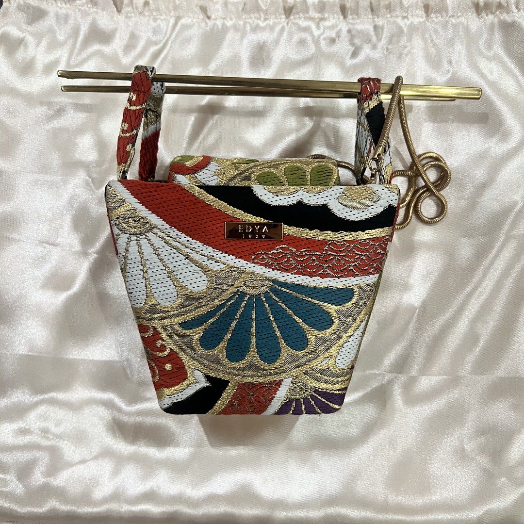 EDYA 1929 Chopstick Bag (Category: Purses & Pouches) located in Manila. Submitted by limonee (Listing ID 1451268306, Image 1). Description: - Chopstick handles are removable although one side (the thinner end of the chopsticks) is slightly looser than the other, but they remain securely in place during use and don’t come out easily - Chopsticks have light surface scratches and signs of wear from normal use (pls see close up photos) but are not no