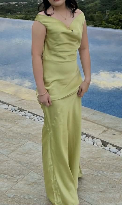 Lime Green Cowl Neck Maxi Dress (Category: Dresses) located in Cebu City. Submitted by ibyang_blgn (Listing ID 1451246315, Image 2). Description: - Flowy lime green maxi dress - Elegant cowl neck design - Satin-like material for a luxurious feel - Drapes beautifully and fits well - Ideal for special events or a night out.