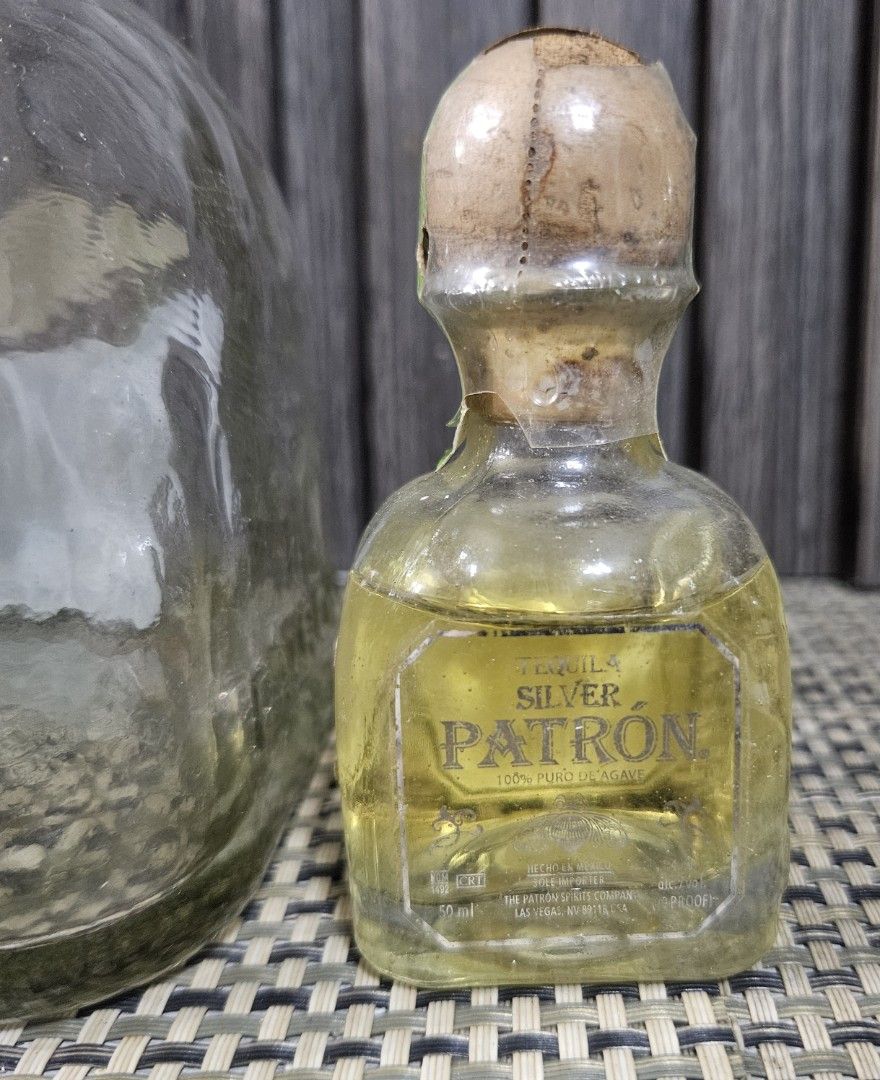 Limited Edition Patron Silver Tequila Bottle & Mini (Category: Water Bottles & Tumblers) located in Rizal. Submitted by cherry_garcia (Listing ID 1451244003, Image 2). Description: - Limited Edition Patron Silver Tequila Set - Includes full-sized bottle (Empty) and mini bottle (Sealed) - Comes in a unique, colorful tin packaging - Ideal for tequila collectors or as a special gift.