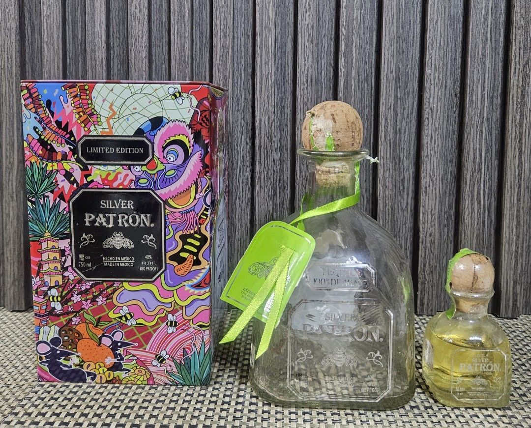 Limited Edition Patron Silver Tequila Bottle & Mini (Category: Water Bottles & Tumblers) located in Rizal. Submitted by cherry_garcia (Listing ID 1451244003, Image 1). Description: - Limited Edition Patron Silver Tequila Set - Includes full-sized bottle (Empty) and mini bottle (Sealed) - Comes in a unique, colorful tin packaging - Ideal for tequila collectors or as a special gift.