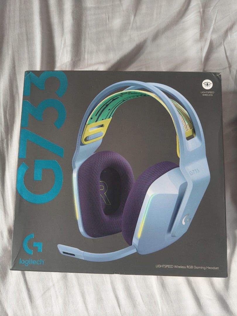 Logitech G733 LIGHTSPEED Wireless RGB Gaming Headset (Category: Headphones & Headsets) located in Manila. Submitted by lizzie.roma (Listing ID 1451223058, Image 1). Description: - Logitech G733 LIGHTSPEED wireless gaming headset - bought in Singapore - Striking blue and purple colorway - Customizable RGB lighting - Includes original packaging - Excellent for an immersive gaming experience.